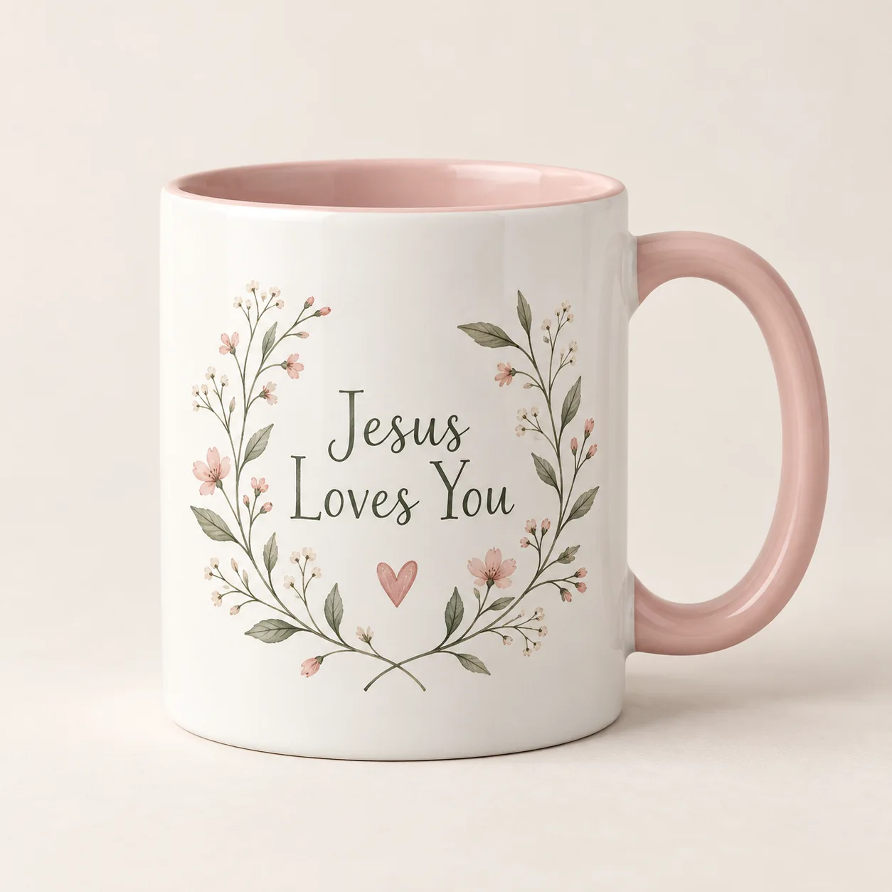 Jesus Loves You Christian Coffee Mug – Heart Design – Design Preview Jesus Loves You Christian coffee mug with a blush handle, heart and botanical artwork